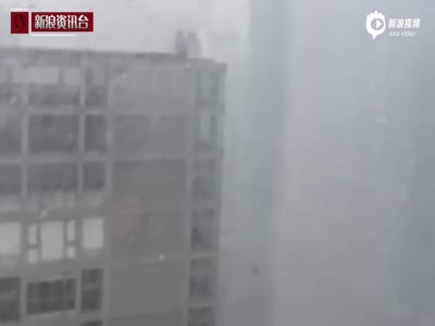 北京遭遇暴风雨加冰雹 个个有鹌鹑蛋大小